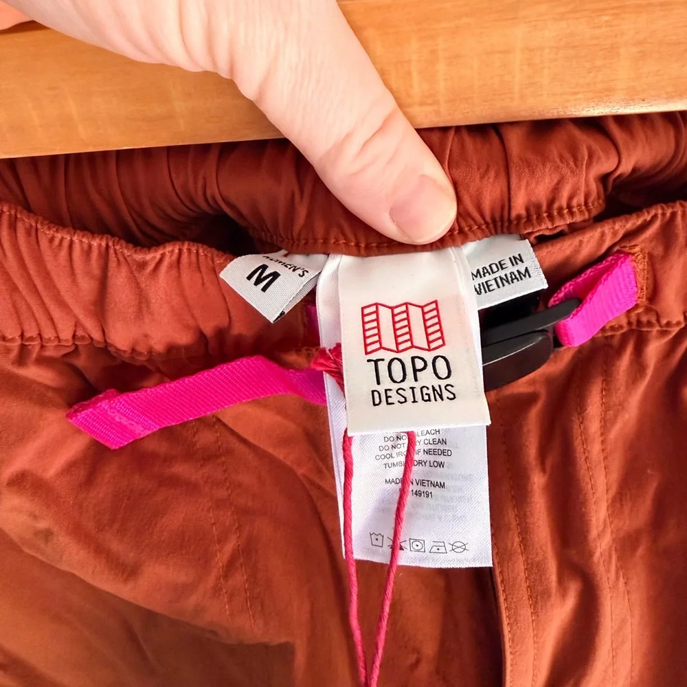 Topo Designs Rust Orange Athletic Shorts with Pink Belt